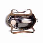 Top down view of biscuit canvas tote holding book laptop and travel mug | KlippiK Middle East