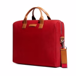 Angled view of crimson red Fleet messenger briefcase with crossbody strap | KlippiK Kuwait