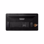 Black leather DailyObjects desk mat with iMac Apple keyboard Magic Mouse iPhone and coffee — home office Middle East