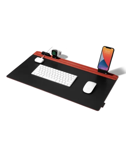 Red-Black Snap On Organiser Desk Mat — black mat with red toolbar holding a phone mount and cable holder above a keyboard