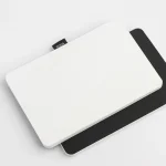 Roda Notepad angled to show the rigid black backing board behind the sheets
