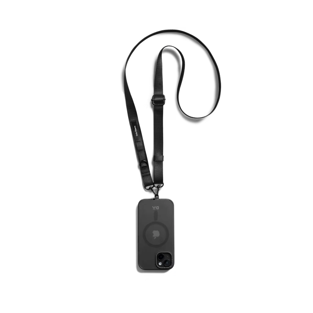 Black-Crossbody-Utility-Phone-Lanyard-Strap Black Crossbody Utility Phone Lanyard - Strap attached to a black phone case, shown hanging against a white background