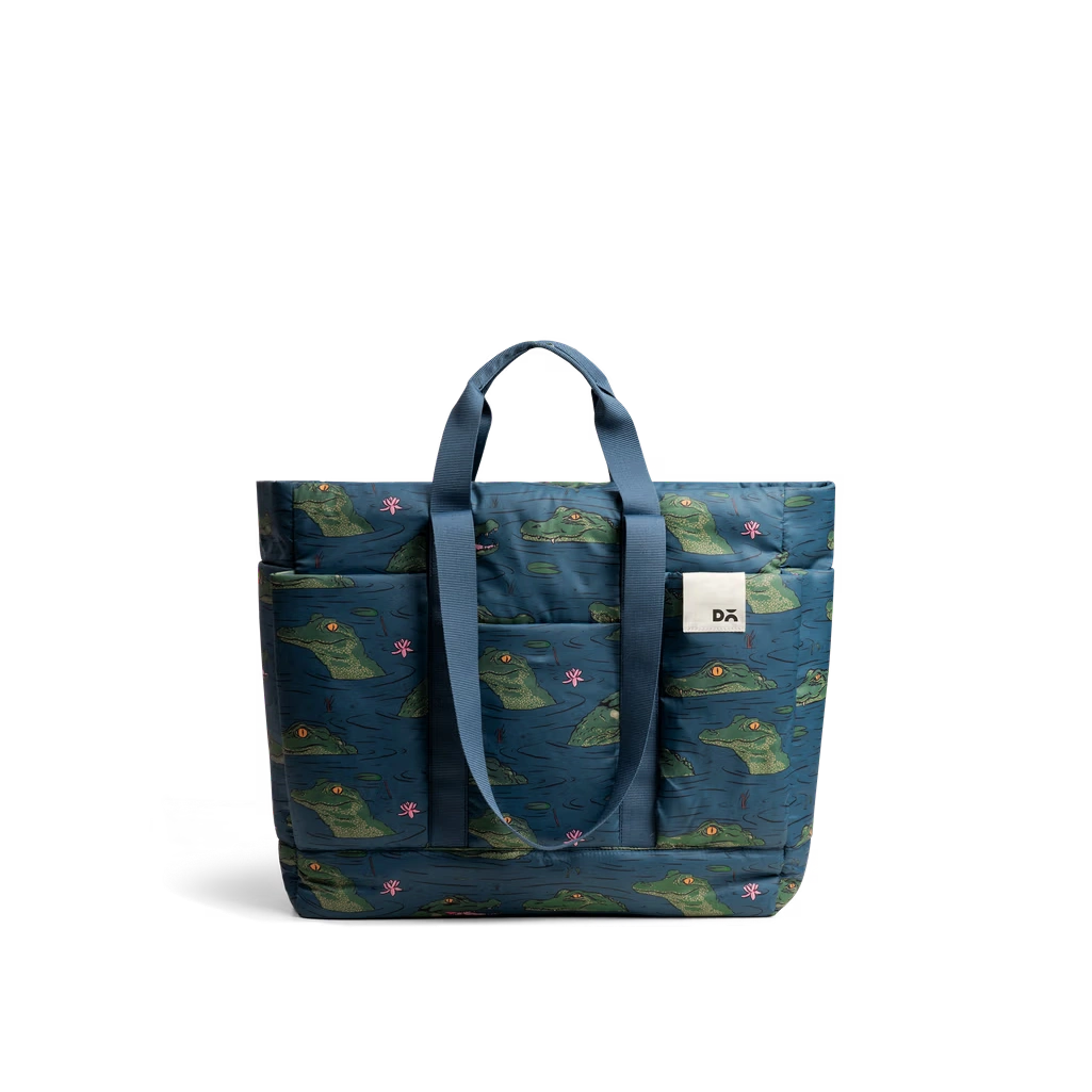 Blue-Idyll-Tote Alligator Idyll Tote Bag — lightweight tote with twin shoulder handles, shown on white