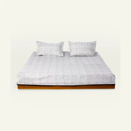Mocha Brown with Haze Indigo Pure Stripes Flat Bedsheet shown made up on a low wooden platform bed with two matching pillows