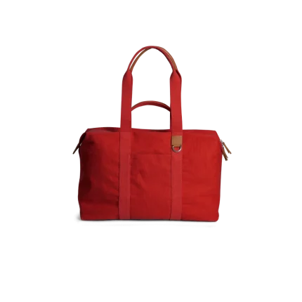 Crimson Red Field Duffle Bag — canvas duffle with leather trim and twin handles, shown on white