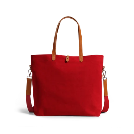 Crimson Red Buoy Tote Bag in red canvas with tan leather handles and a detachable shoulder strap