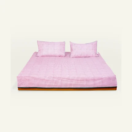 Berry Pink with Pearl Green Pure Stripes Flat Bedsheet shown made up on a low wooden platform bed with two matching pillows