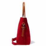 Side profile of crimson red canvas Buoy tote bag showing leather handle | KlippiK Worldwide