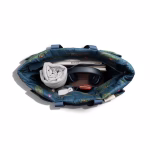 Top down interior view of alligator tote with books headphones and towel | KlippiK Worldwide