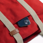 pocket detail of crimson red Field tote bag showing canvas | KlippiK Worldwide