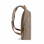 Side profile of beige canvas daypack showing depth and leather pulls | KlippiK Worldwide