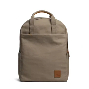 Khaki Beige Field Daypack — canvas daypack with a top handle and leather logo patch, shown on white