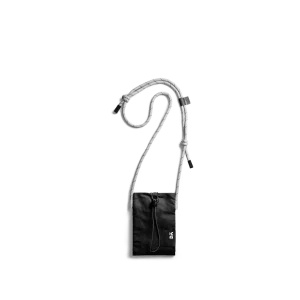 Carbon Black Kick Phone Pocket with its crossbody cord, shown hanging on white