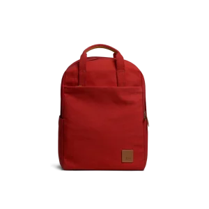 Crimson Red Field Daypack — canvas daypack with a top handle and leather logo patch, shown on white
