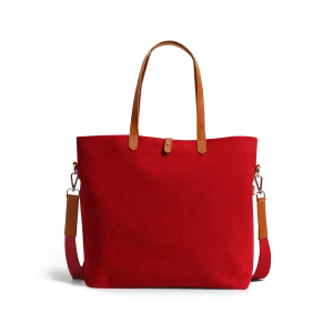 Crimson Red Buoy Tote Bag in red canvas with tan leather handles and a detachable shoulder strap