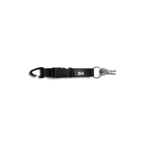 Dark Grey Flint Keychain laid flat on white — webbing strap with a metal clip and D-ring