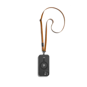 Tan Leatherite Crossbody Phone Lanyard - Strap attached to a black phone case, shown hanging against a white background