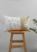 Celeste embroidered 100% Cotton Cushion Cover for Sofa - Nile Blue by Yellow Dwelling, styled on a light wood stool against a pale wall