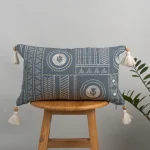 Cosmos Printed 100% Cotton Floral-Geometric Design Cushion Cover for Sofa - Blue by Yellow Dwelling, styled on a light wood stool against a pale wall