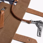 Side detail of biscuit canvas tote with keys clipped to leather loop | KlippiK Kuwait