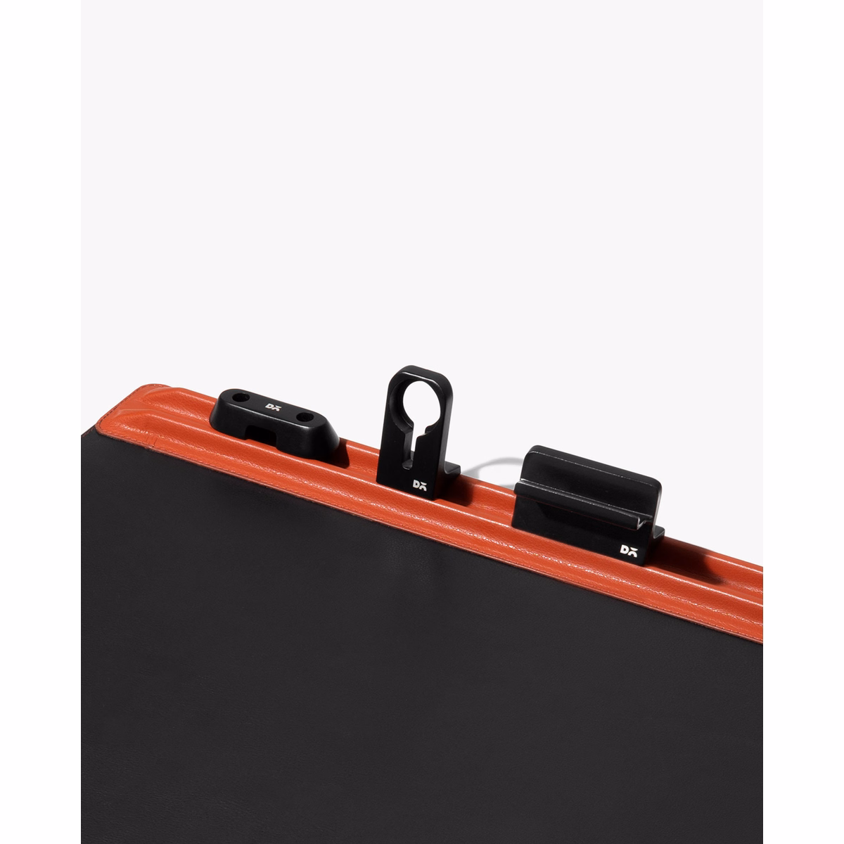 Red-Black Snap On Organiser Desk Mat with Cable Holder + Phone Mount + Apple Watch Charging Stand in Black – Close-up of Mat showcasing different compartments | KlippiK