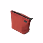 Angled view of coral red ripstop Coral Pivot carry all pouch | KlippiK Kuwait
