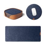 Felt Desk Trio Bundle in blue — navy desk mat, round mouse pad and coaster set laid out on white
