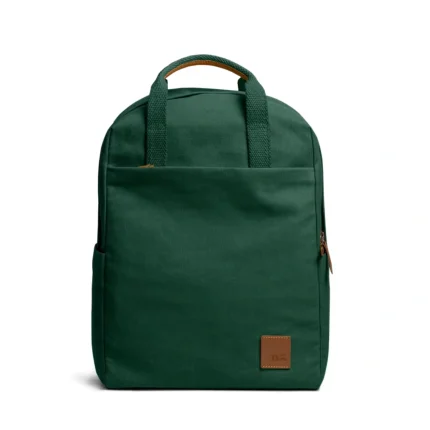 Forest Green Field Daypack — canvas daypack with a top handle and leather logo patch, shown on white