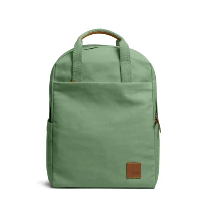 Mint Green Field Daypack — canvas daypack with a top handle and leather logo patch, shown on white