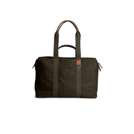 Clove Field Duffle Bag — canvas duffle with leather trim and twin handles, shown on white