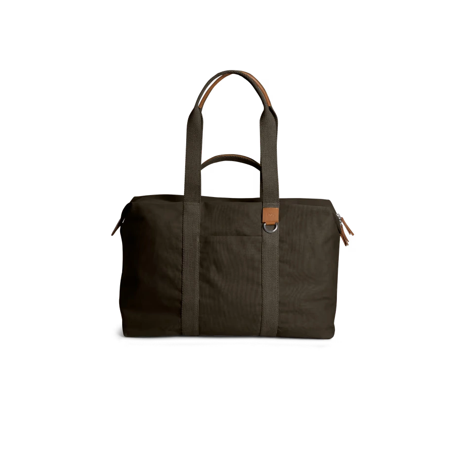 Clove-Field-Duffle-Bag-vw Clove Field Duffle Bag — canvas duffle with leather trim and twin handles, shown on white