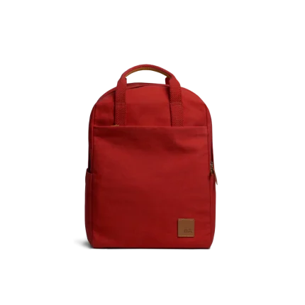 Crimson Red Field Daypack — canvas daypack with a top handle and leather logo patch, shown on white