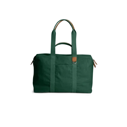 Forest Green Field Duffle Bag — canvas duffle with leather trim and twin handles, shown on white