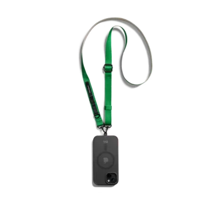 Green Crossbody Utility Phone Lanyard - Strap attached to a black phone case, shown hanging against a white background