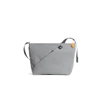 Light Grey Joules Crossbody Bag — fabric crossbody with an adjustable strap, shown on white