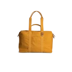 Mustard Field Duffle Bag — canvas duffle with leather trim and twin handles, shown on white