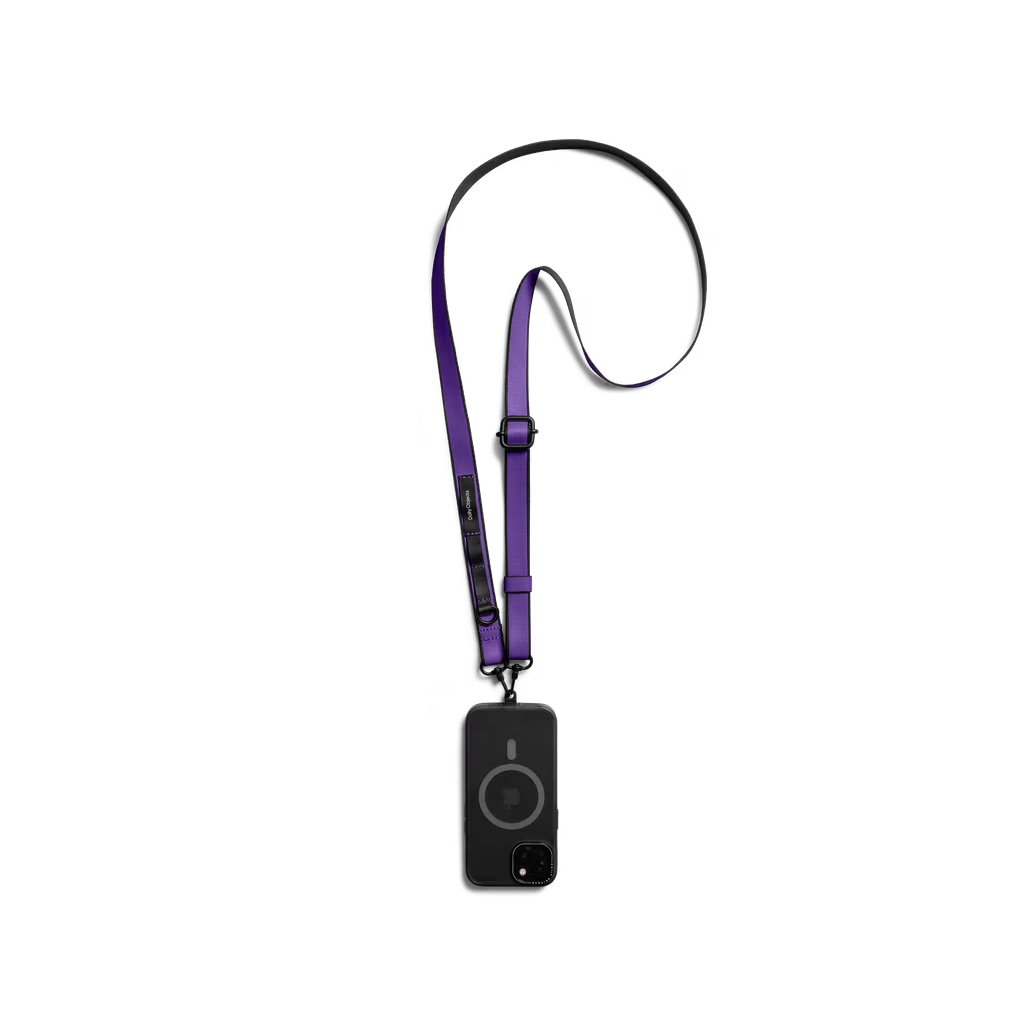Purple-Strobe-Lanyards Purple Strobe Lanyards attached to a black phone case, shown hanging against a white background