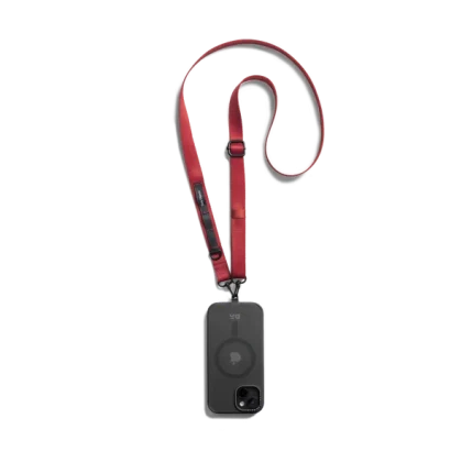 Red Crossbody Utility Phone Lanyard - Strap attached to a black phone case, shown hanging against a white background