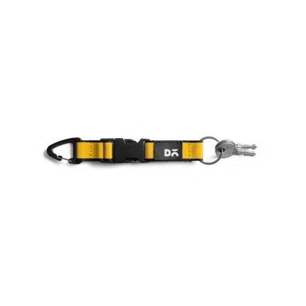 Yellow Flint Keychain laid flat on white — webbing strap with a metal clip and D-ring